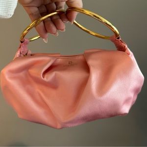 KATE SPADE PINK SATIN BAG WITH FOLD HARWARE. Great condition with protector bag